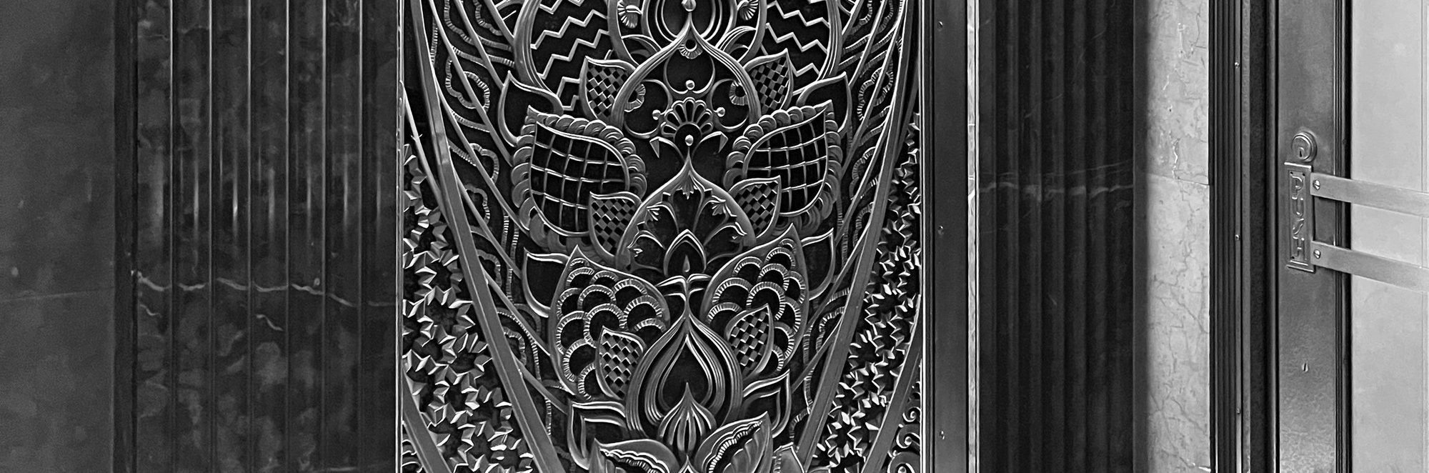 Bronze grille and marble columns in the Chanin Building lobby