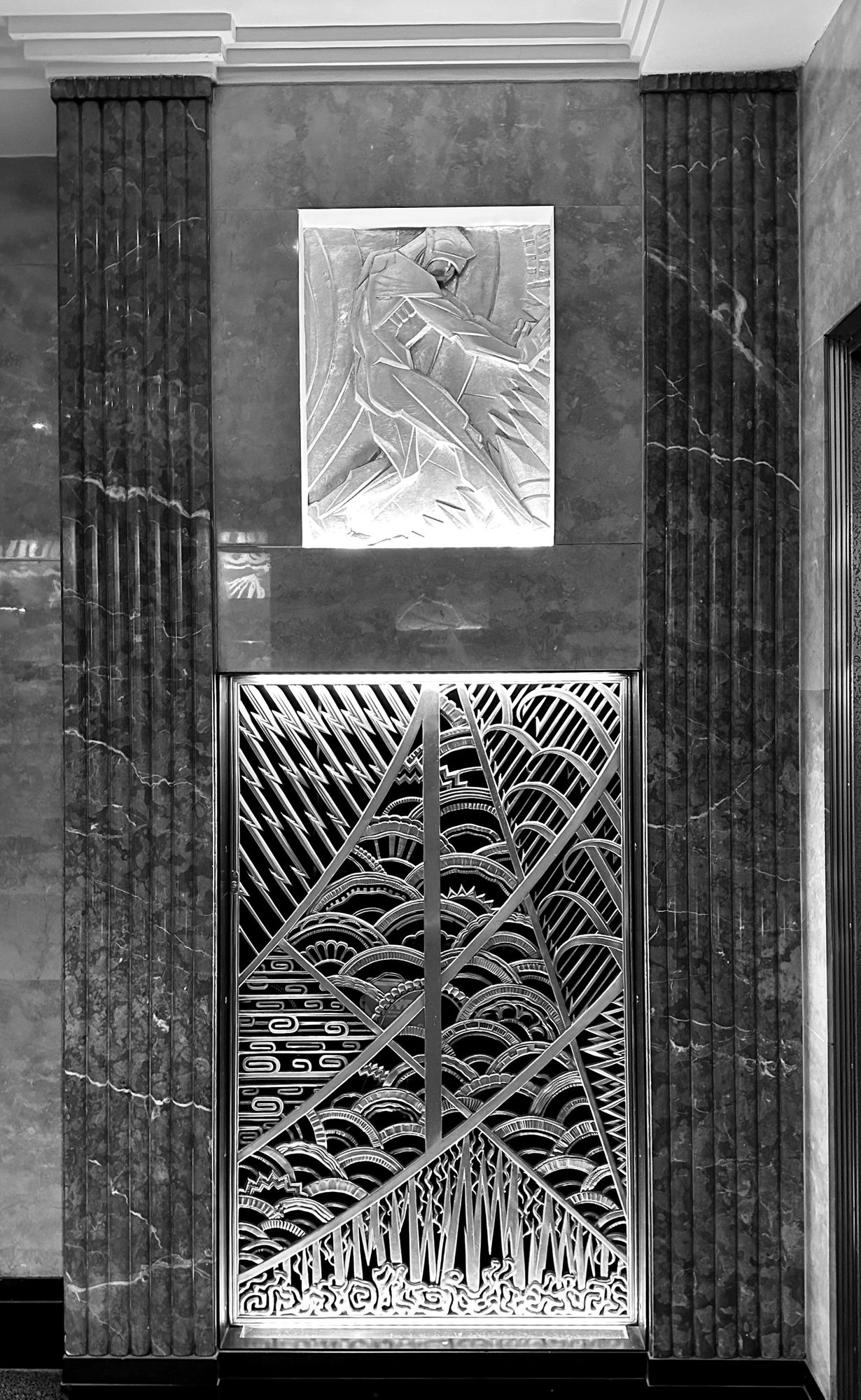 Bronze elevator grille and relief in the Chanin Building lobby
